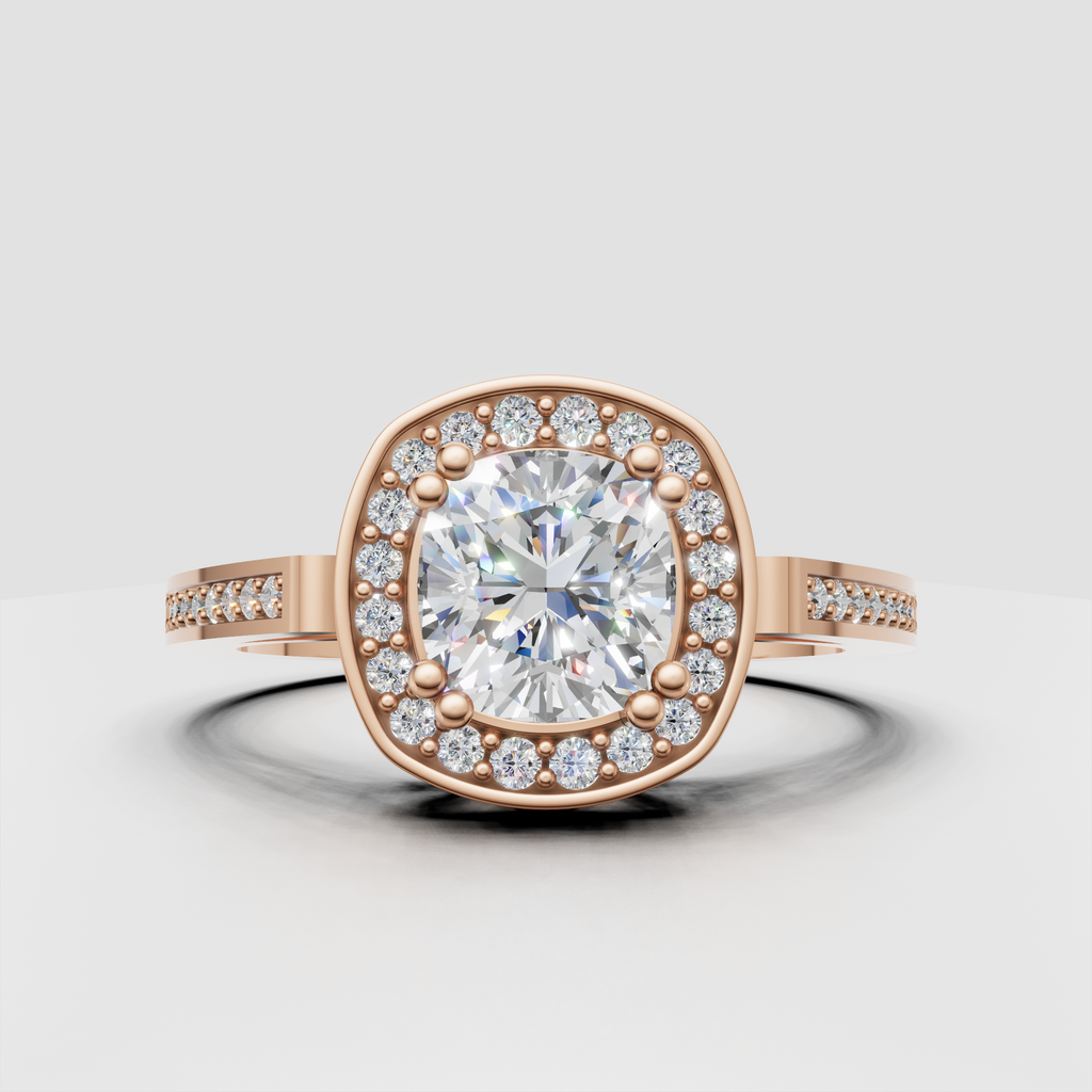 Gold cushion cut engagement ring with round diamond halo