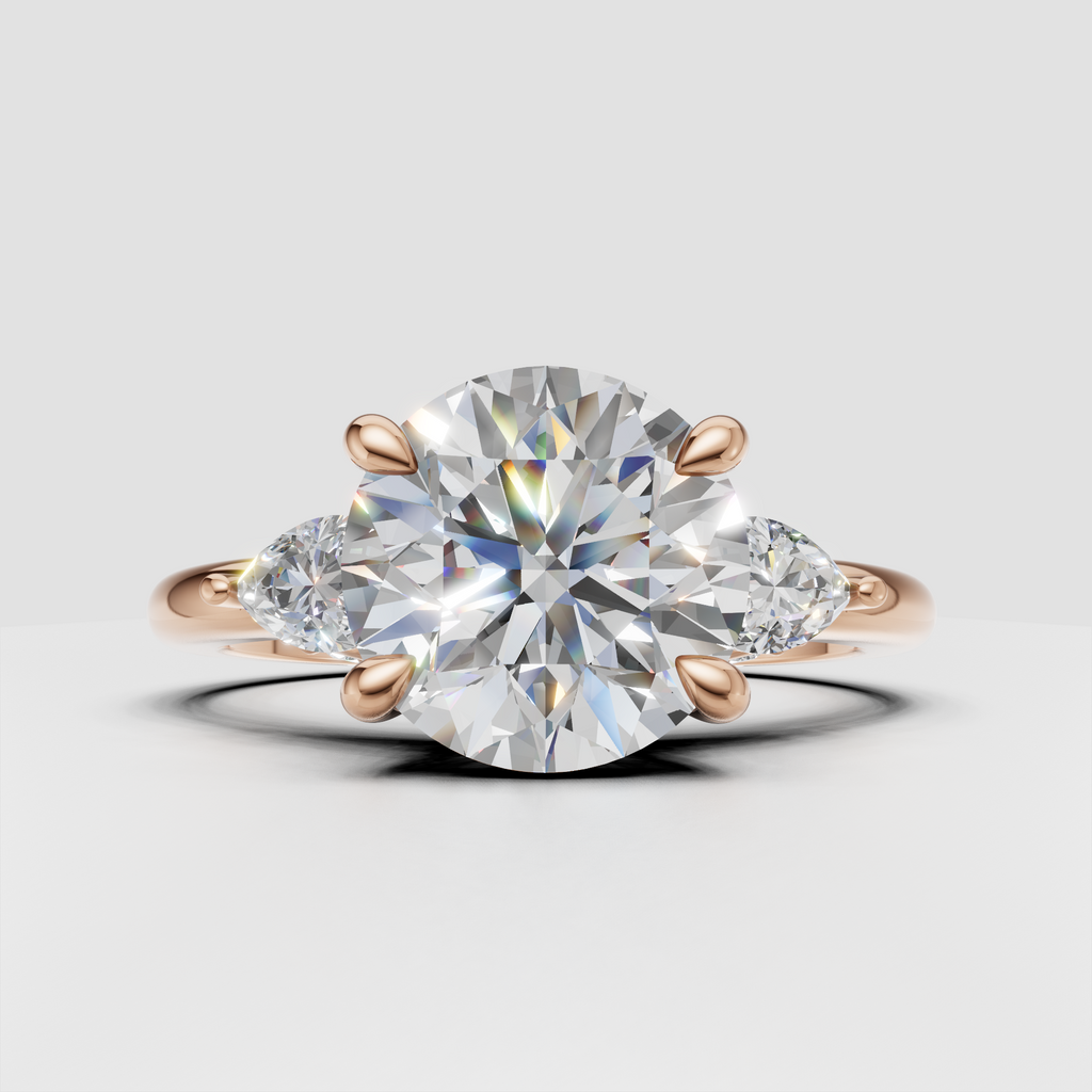 Round diamond ring with delicate pavé shoulder detailing