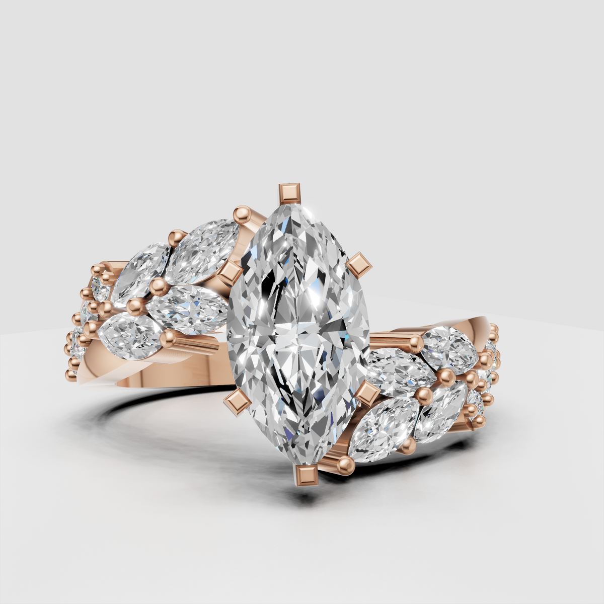 Marquise cut diamond flower-inspired yellow gold ring