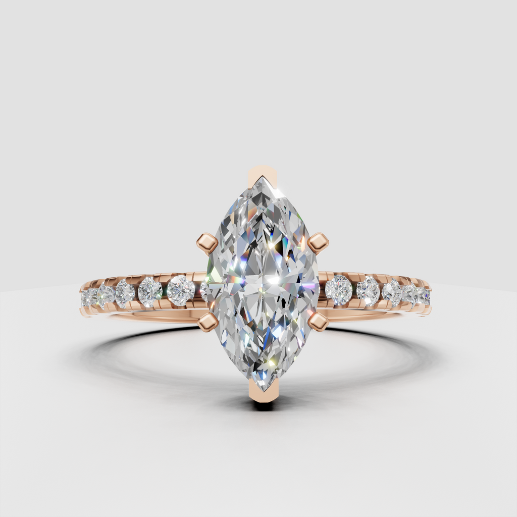Four-prong marquise diamond engagement ring with yellow gold band