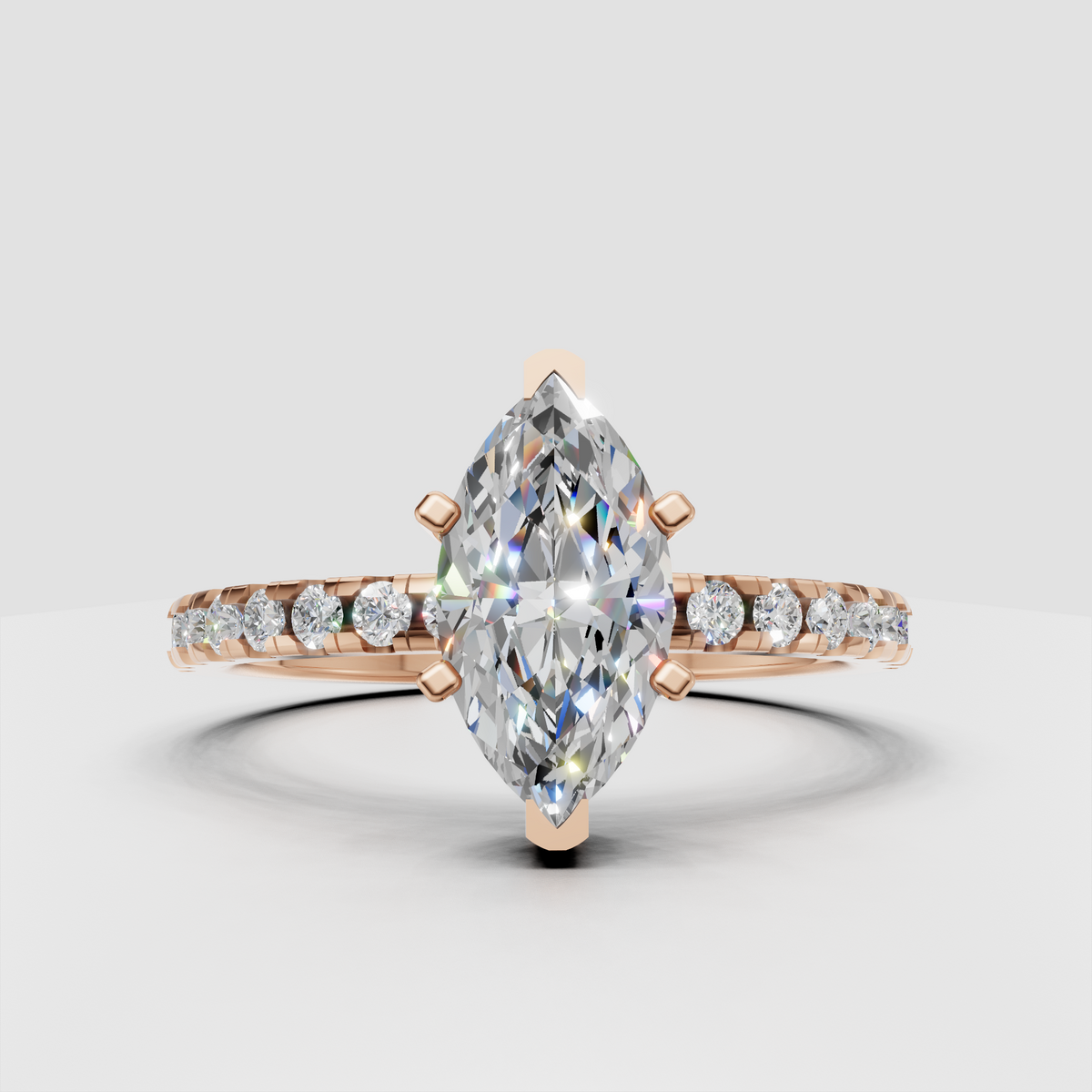 Four-prong marquise diamond engagement ring with yellow gold band