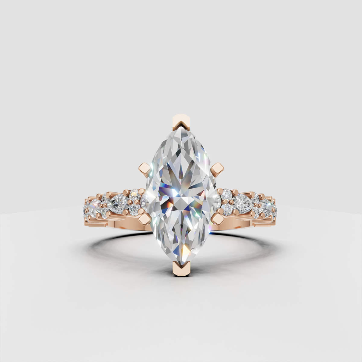Marquise diamond solitaire ring with decorative prongs and polished gold band
