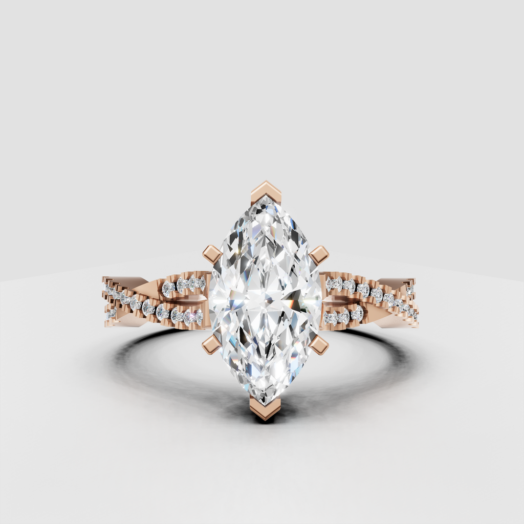 Marquise diamond engagement ring with an elongated center stone and detailed pavé split band.