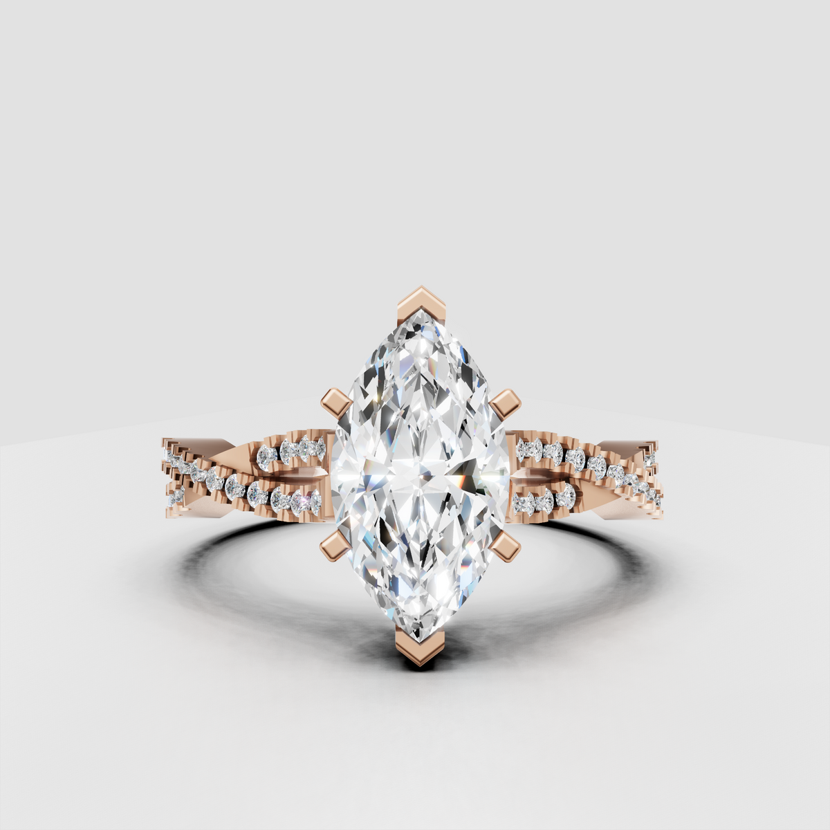 Marquise diamond engagement ring with an elongated center stone and detailed pavé split band.