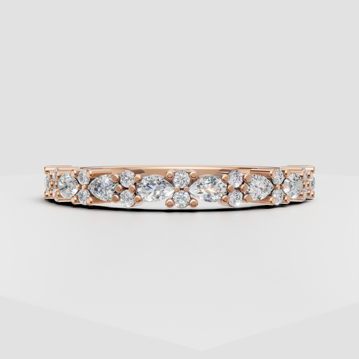 Pear cut and round cut diamond wedding band