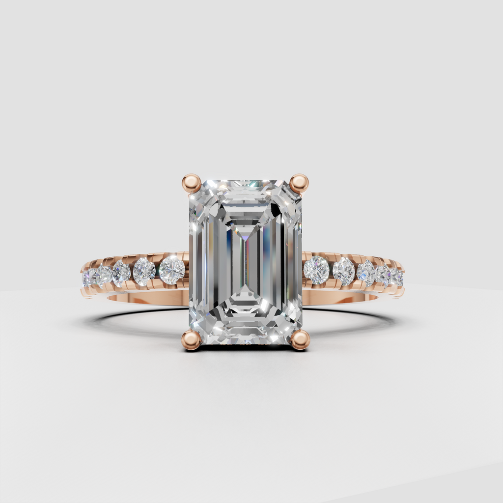 Emerald diamond ring featuring four-prong center setting