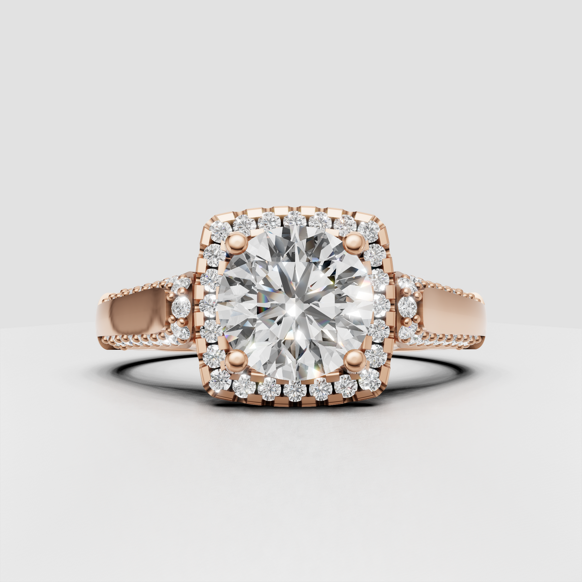 Elegant yellow gold engagement ring with round center and double halo