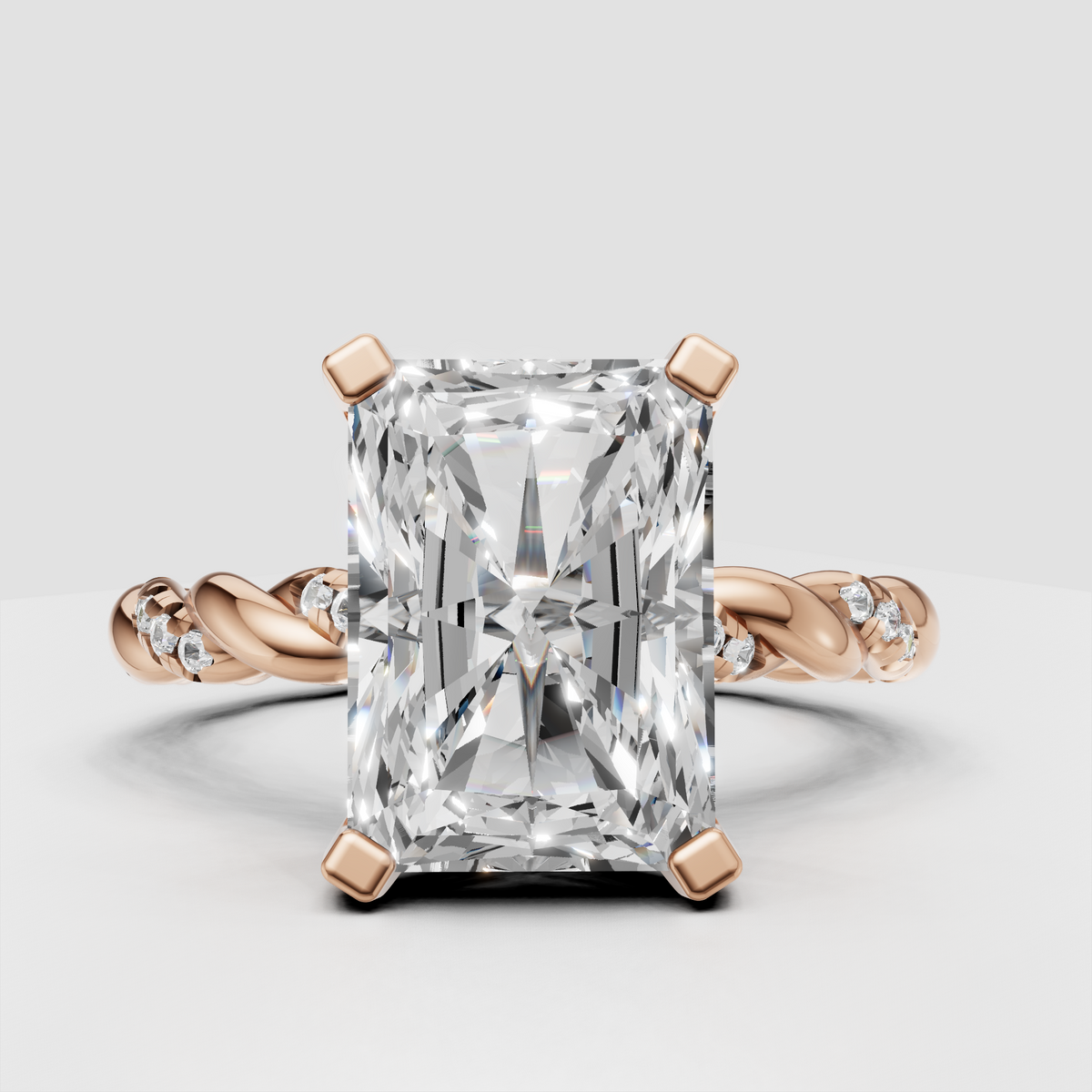 Elegant radiant cut diamond ring with four polished prongs
