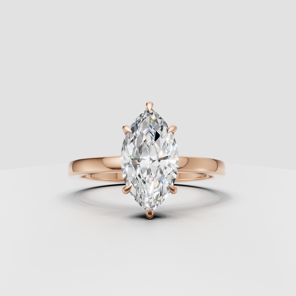 Polished yellow gold band with marquise center stone and six-prong setting