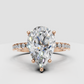 Pavé pear cut diamond engagement ring