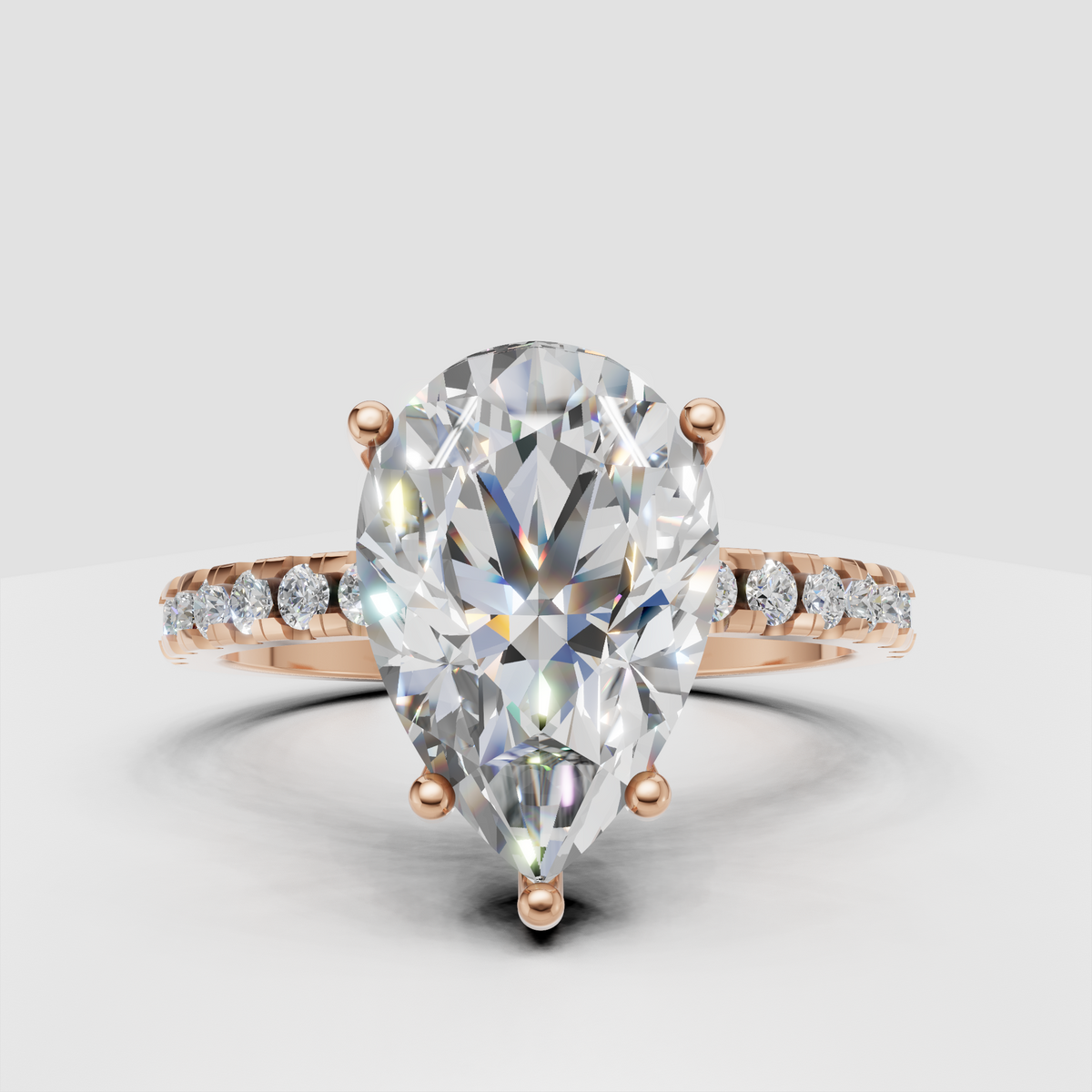 Pavé pear cut diamond engagement ring