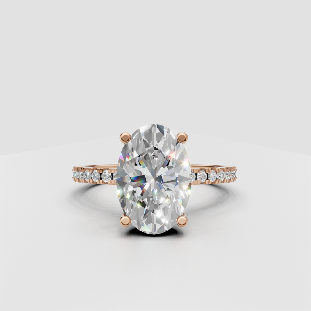 Oval solitaire diamond ring featuring a hidden halo