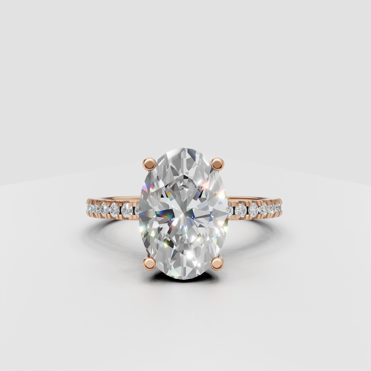 Oval solitaire diamond ring featuring a hidden halo