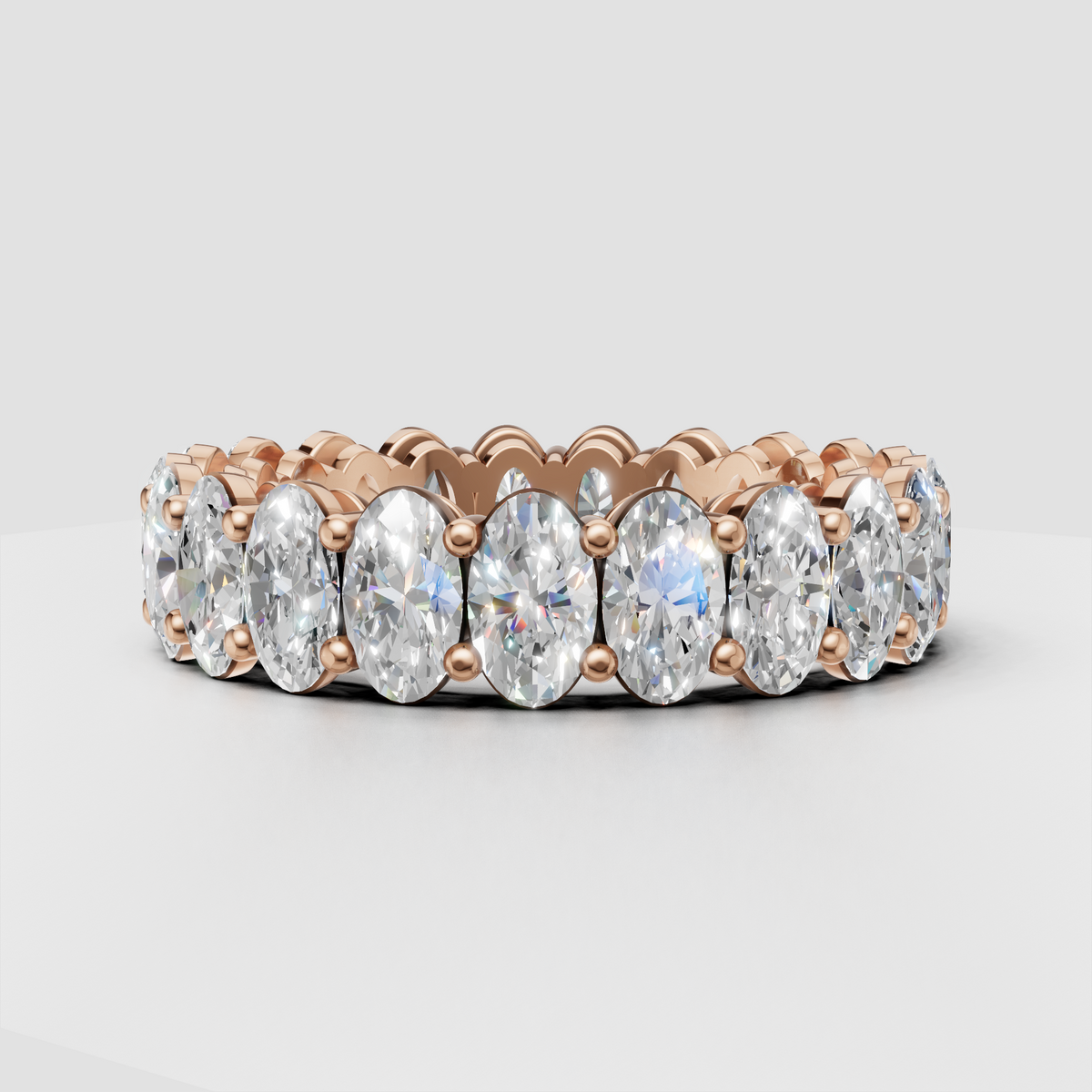 Oval diamond wedding band with open gallery construction