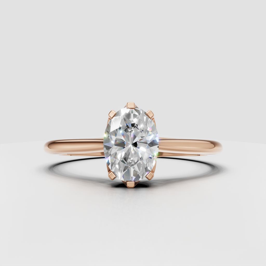 Oval diamond ring featuring a sleek polished gold band