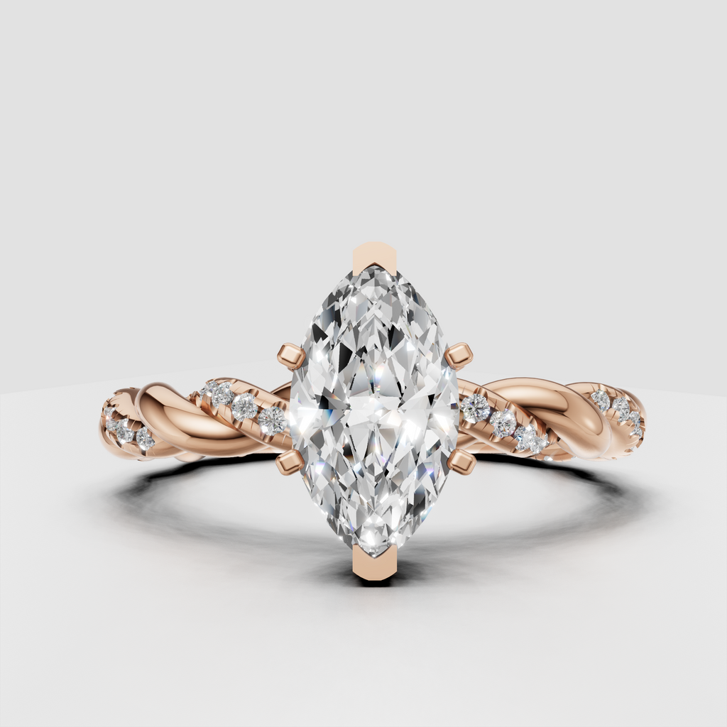 Yellow gold engagement ring with elongated marquise center stone