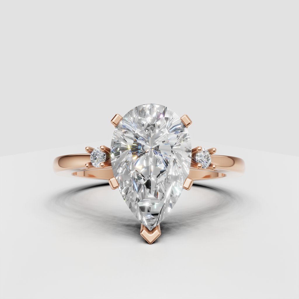 Elegant three stone diamond engagement ring in yellow gold