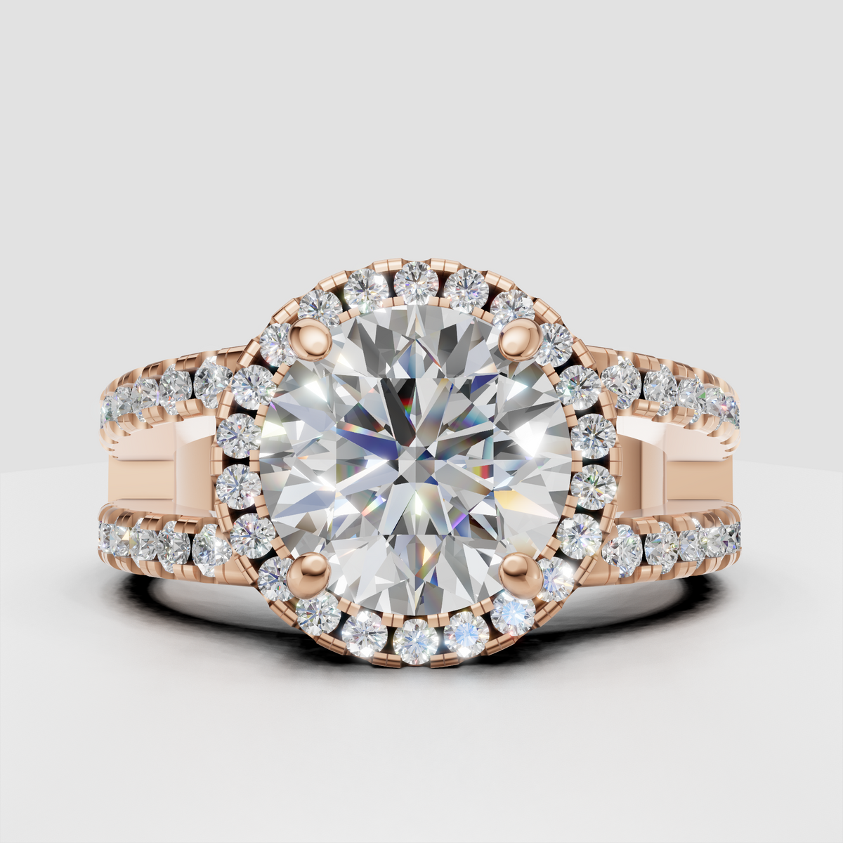 Round diamond engagement ring with intricate split shank and halo setting