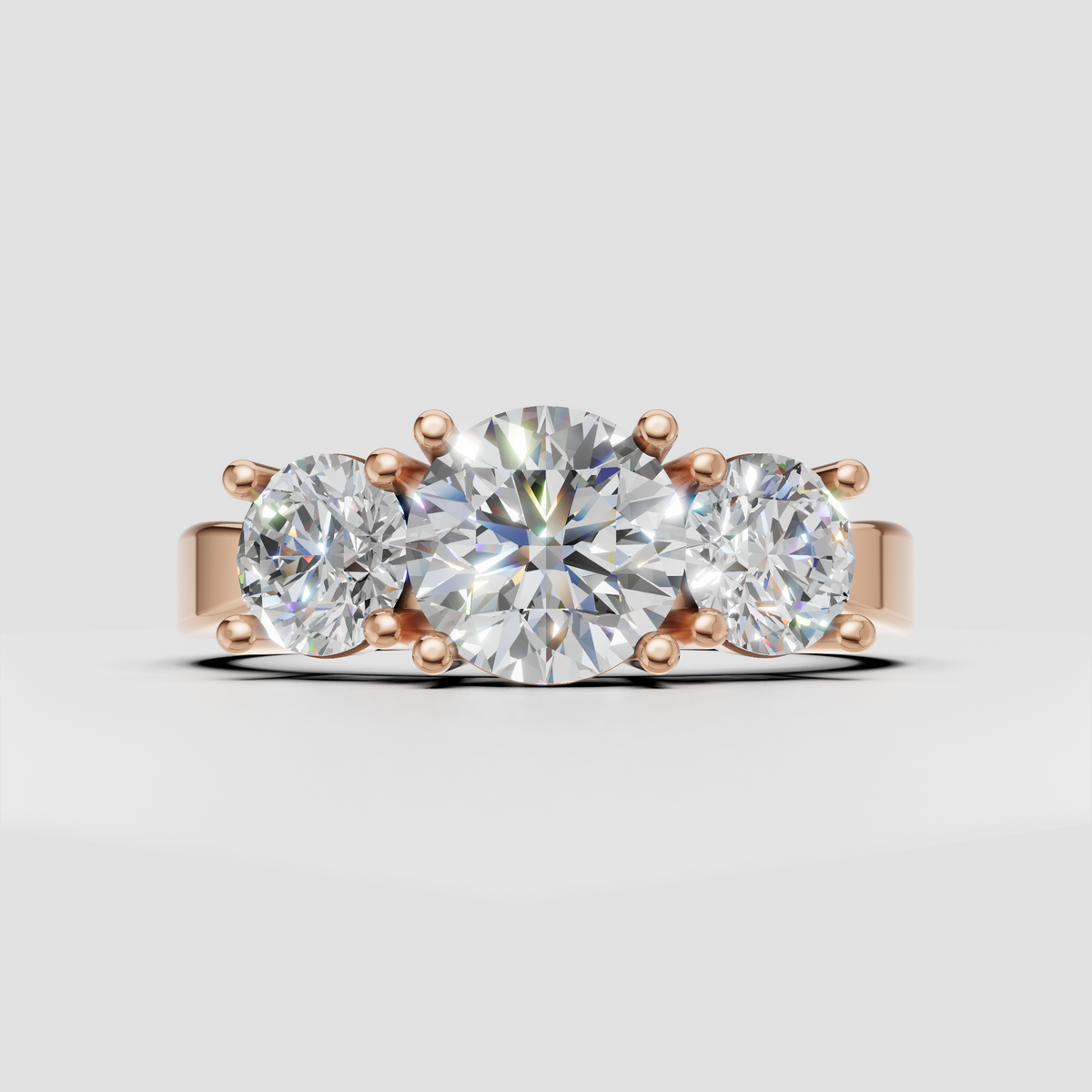Round brilliant center diamond with matching side stones