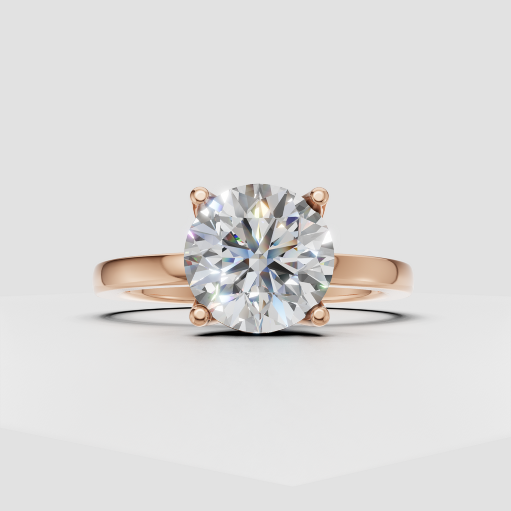 Minimalist yellow gold round diamond engagement ring