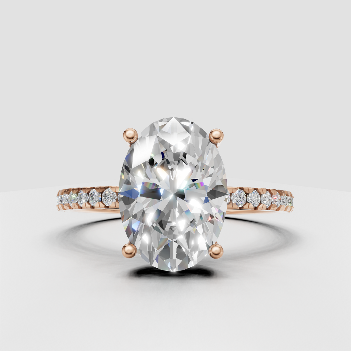 Oval diamond engagement ring with delicate sparkling side stones
