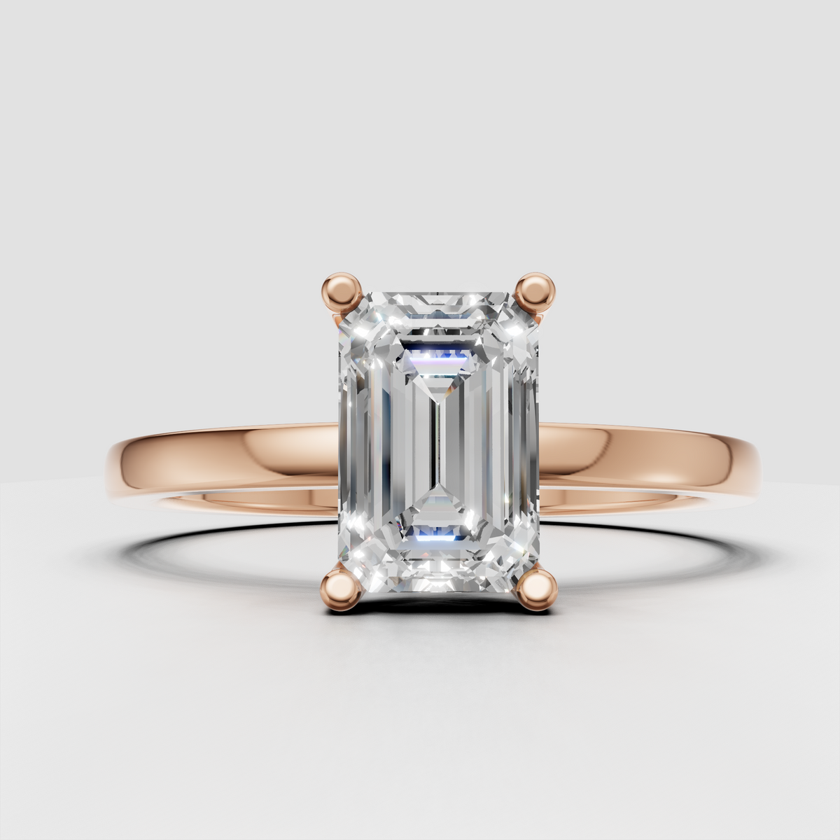 Minimalist emerald cut diamond engagement ring with smooth band