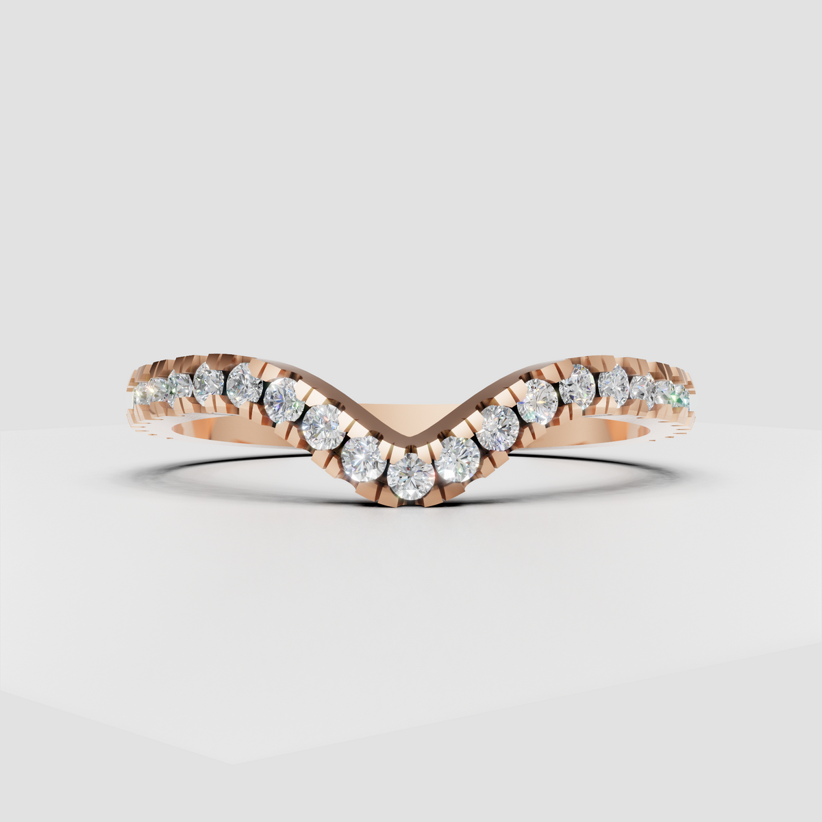 V-shaped diamond band with sparkling round stones across the shoulders