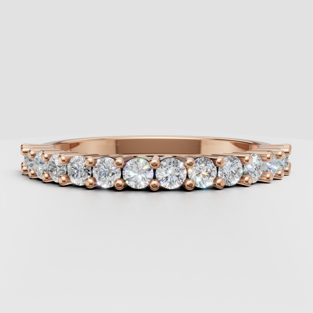 Round brilliant diamond ring with symmetrical half eternity design
