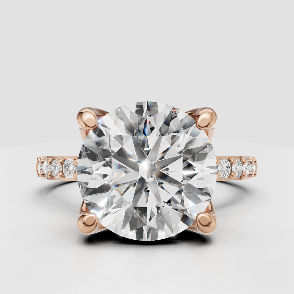 Elegant yellow gold round Diamond ring with four rounded claw-style prongs