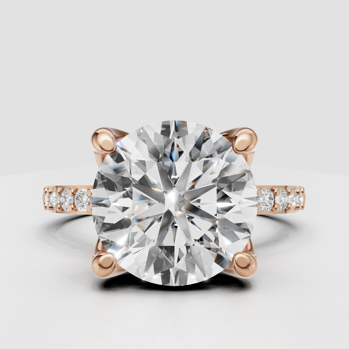 Elegant yellow gold round Diamond ring with four rounded claw-style prongs