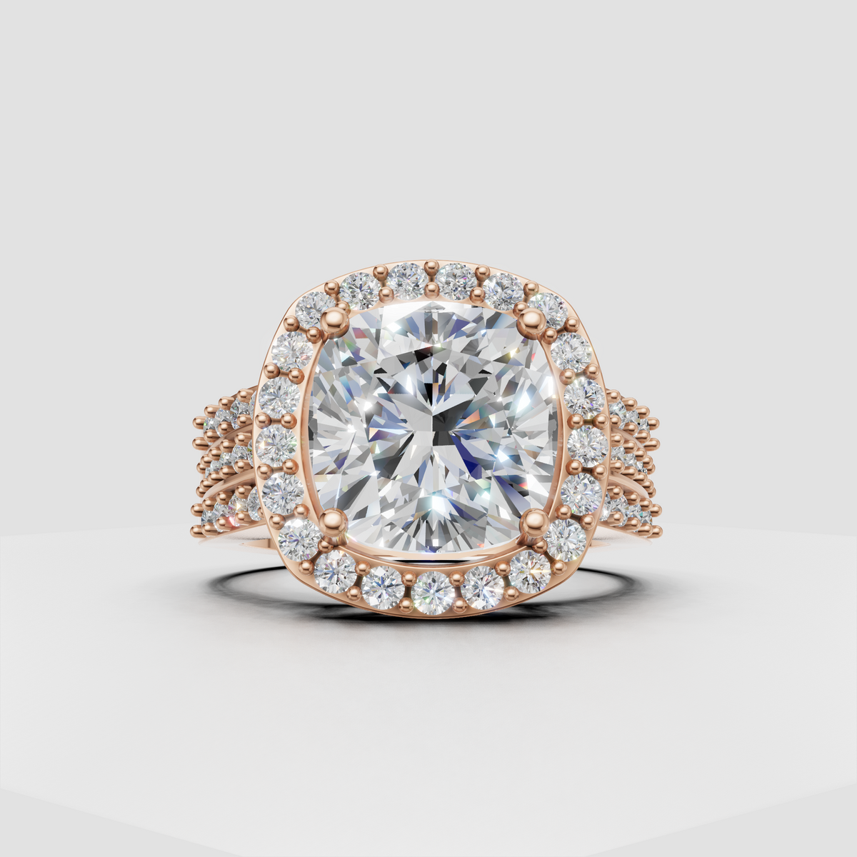 Cushion diamond ring featuring a full sparkling halo and pavé band