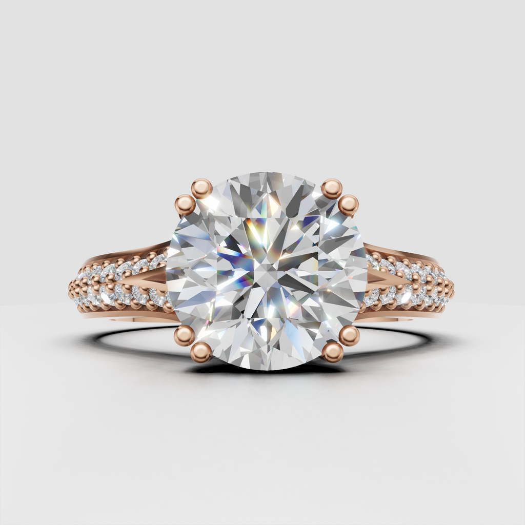 Round Diamond engagement ring with multi-prong setting and micro pavé diamond shoulders