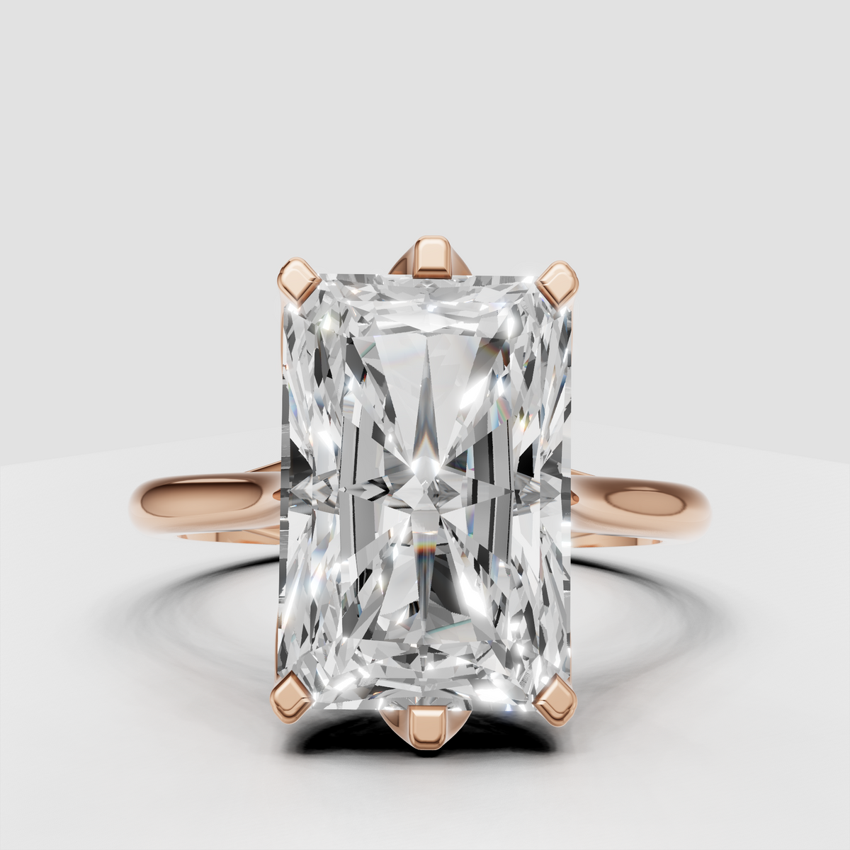 Modern radiant diamond ring with flowing cathedral-style shoulders