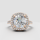 Brilliant cushion diamond ring surrounded by round accent stones