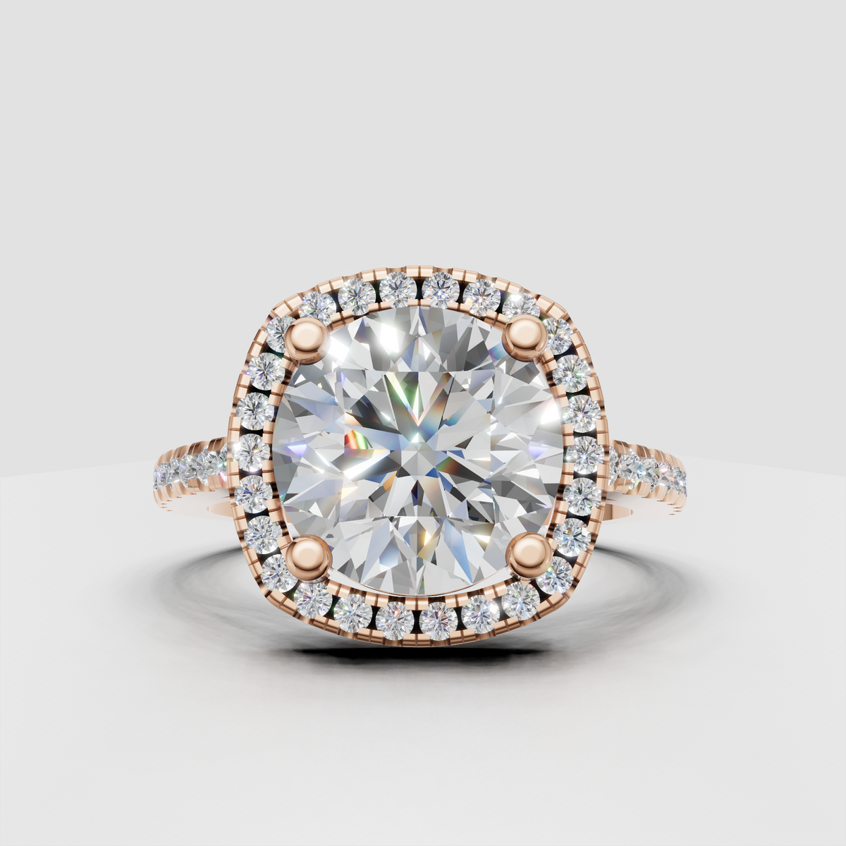 Brilliant cushion diamond ring surrounded by round accent stones