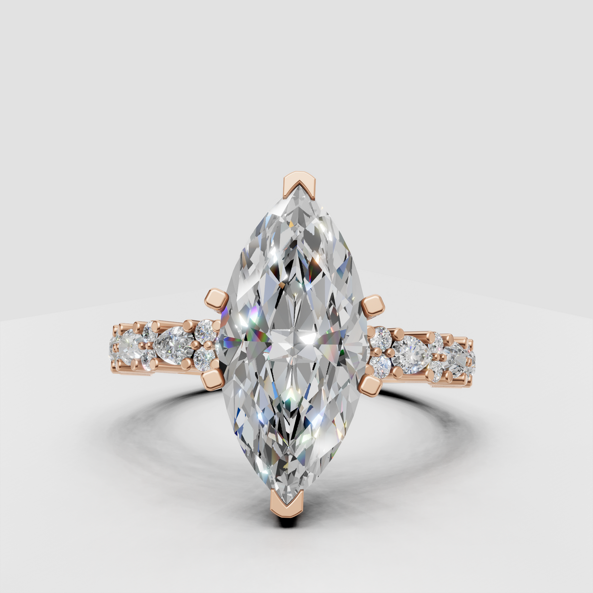 Gold ring featuring marquise and round cut diamonds