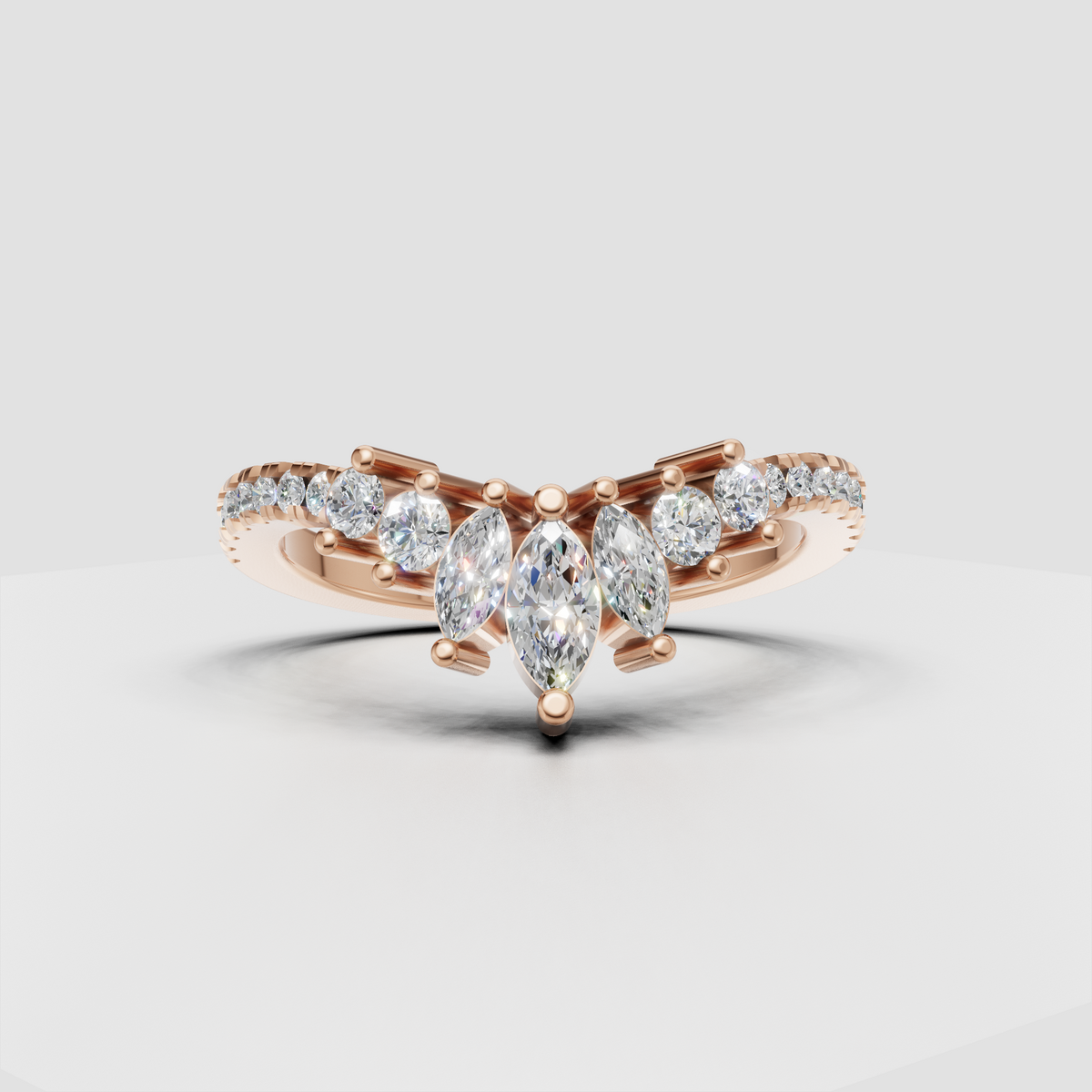Detailed marquise diamond curved band with sparkling round accents