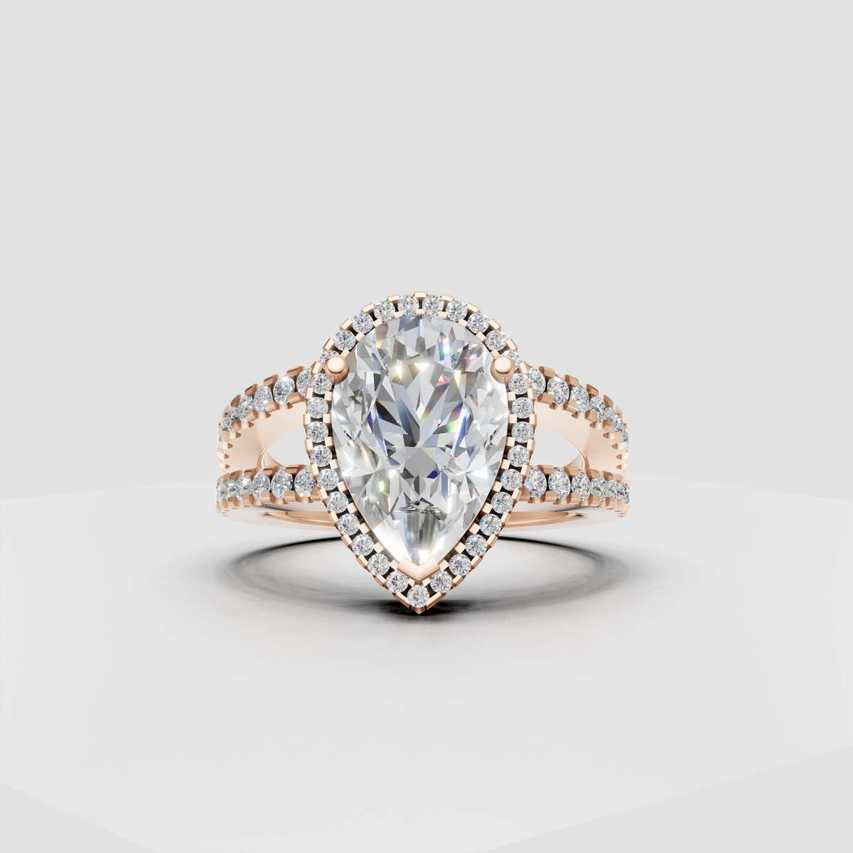 Luxury pear shaped diamond engagement ring with pavé band