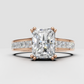Radiant diamond engagement ring with wide gold band