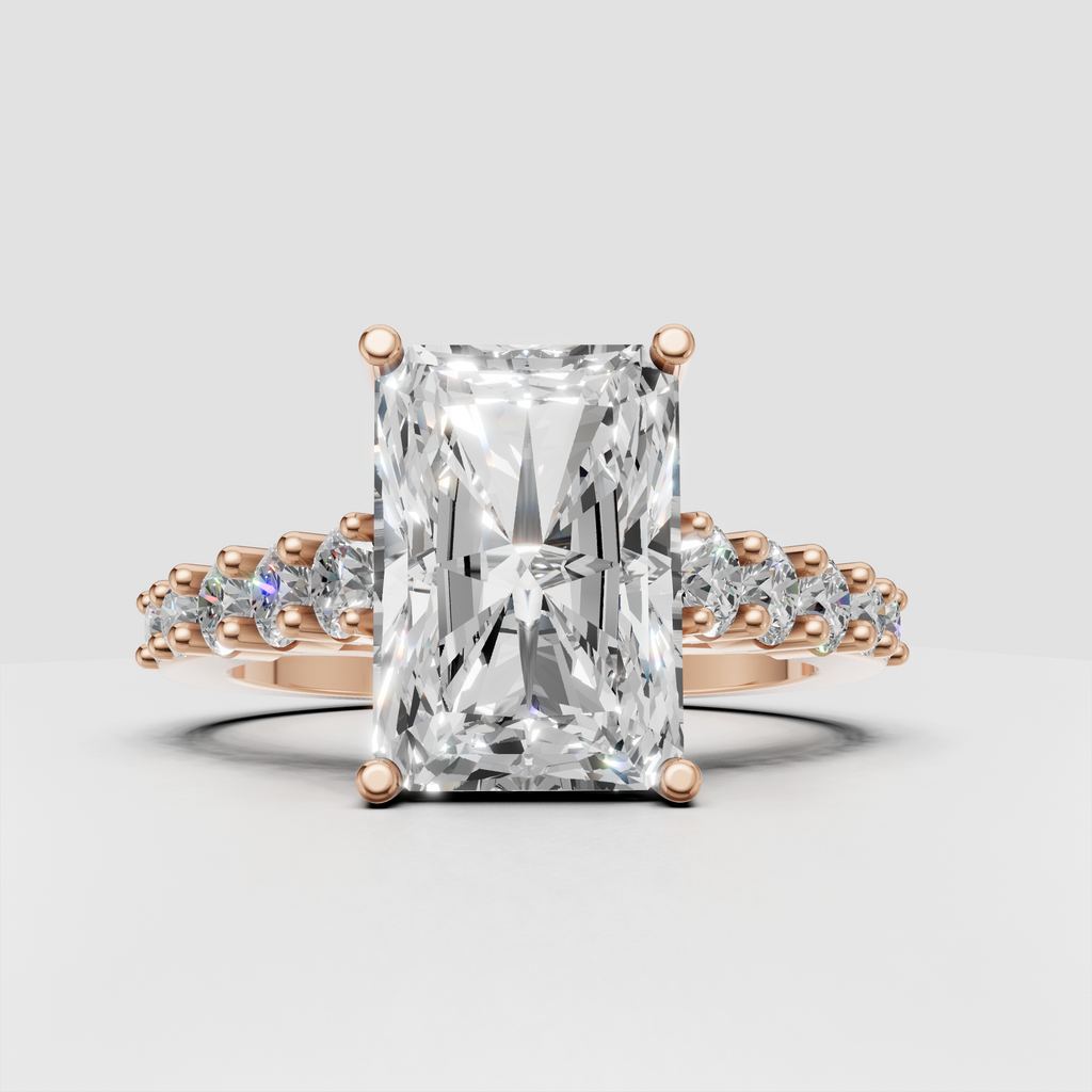 Radiant cut diamond ring with graceful open gallery and side stones