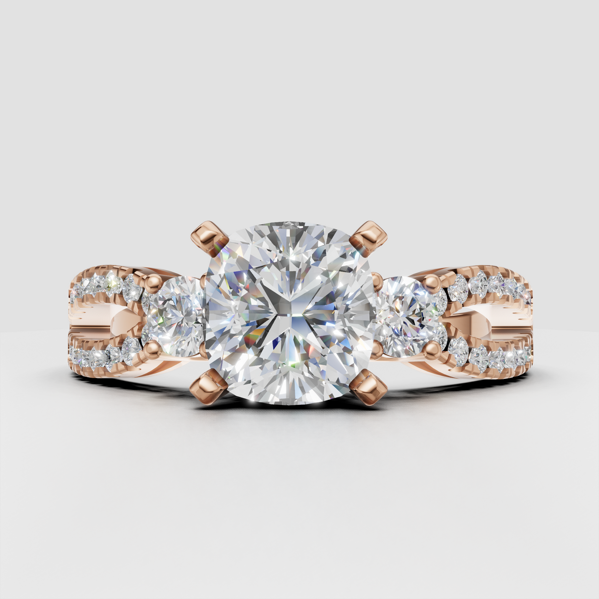 Three stone engagement ring with pavé split shank band