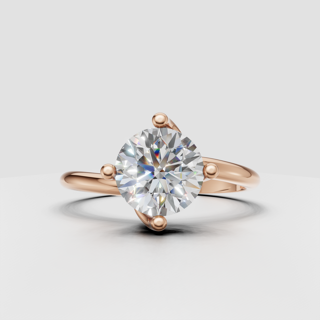 Round diamond engagement ring with sculptural prong setting