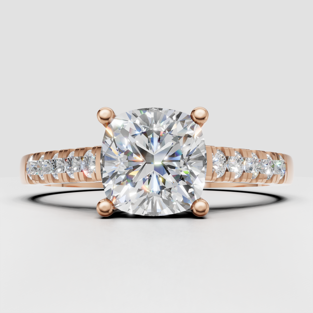 Four-prong cushion cut diamond ring with sparkling shoulder stones