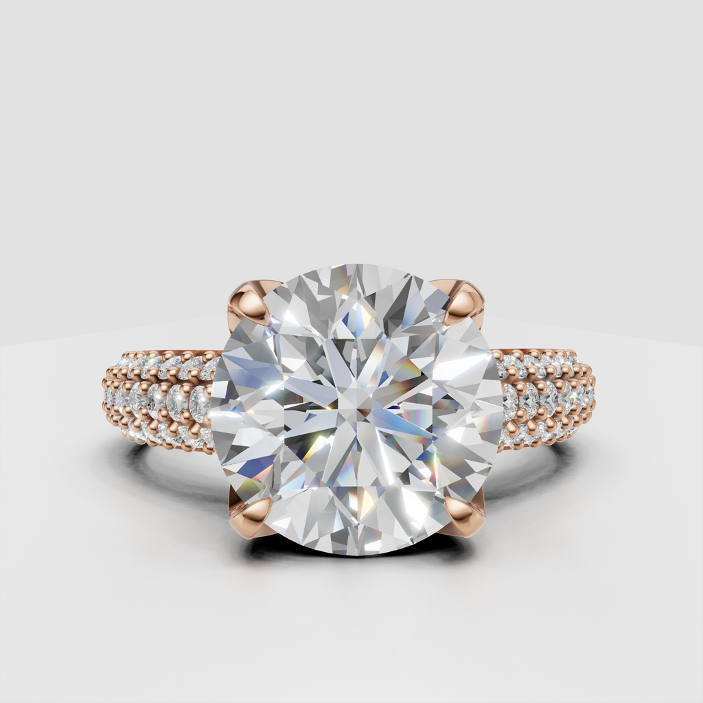 Vintage style engagement ring with round diamond and beaded pavé band