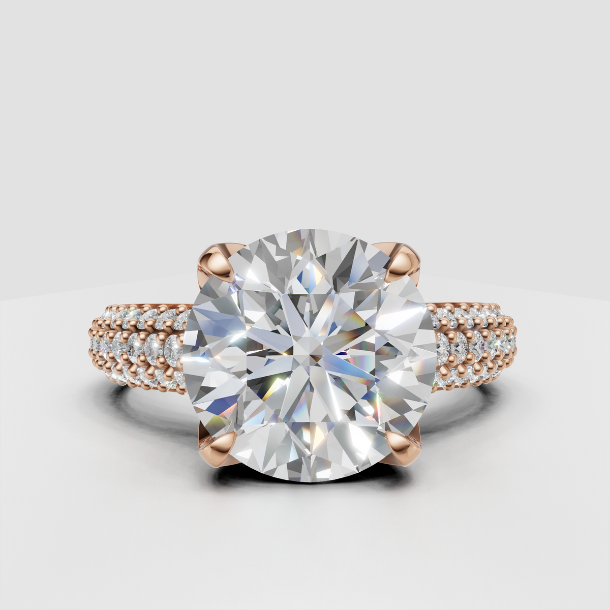 Vintage style engagement ring with round diamond and beaded pavé band