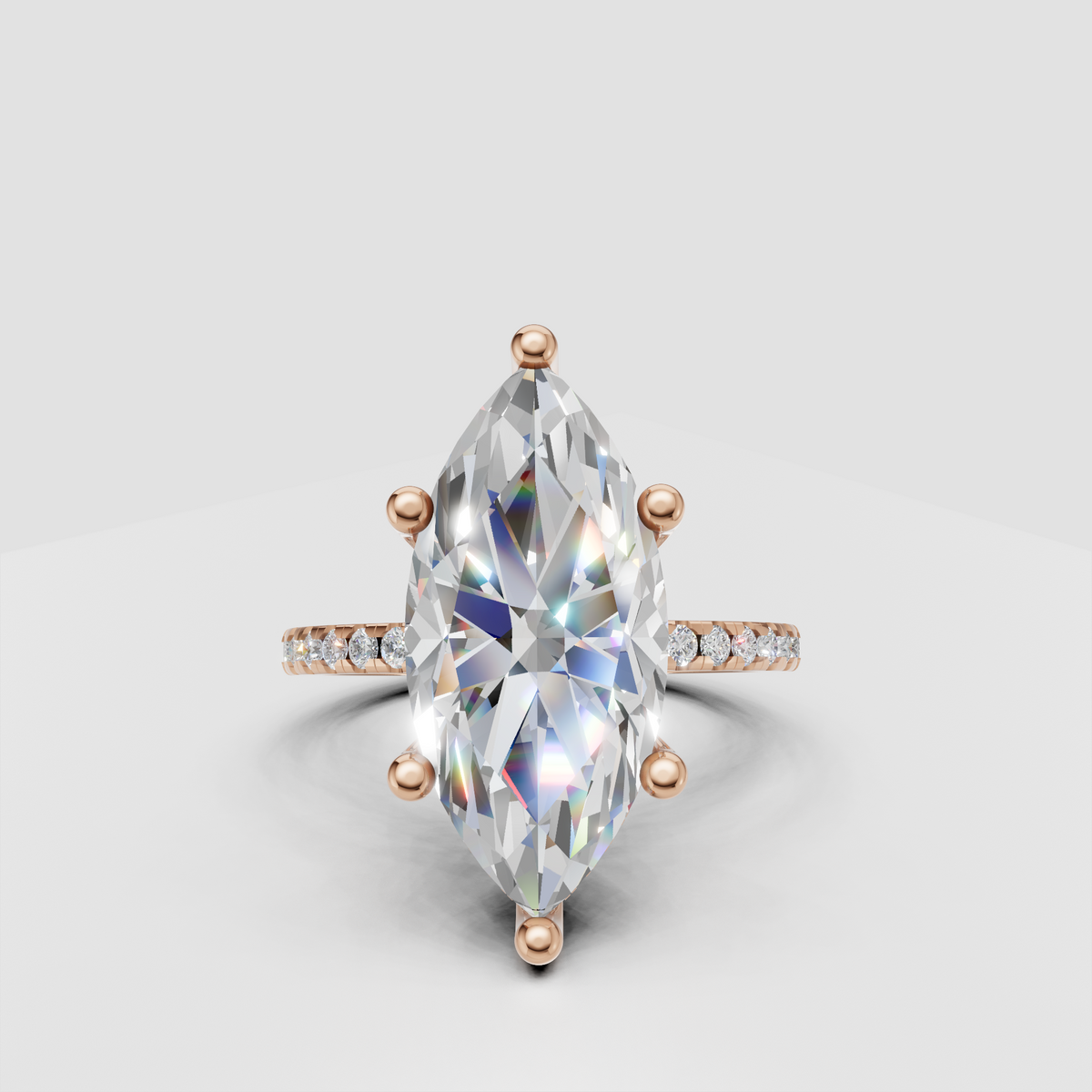 Brilliant marquise diamond ring with sparkling shoulder stones