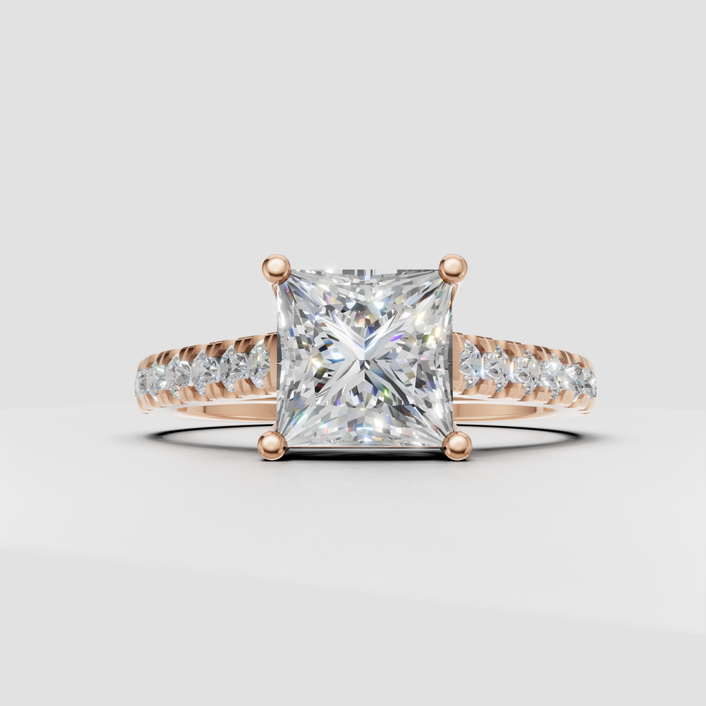Square cut diamond ring with sculpted yellow gold shoulders