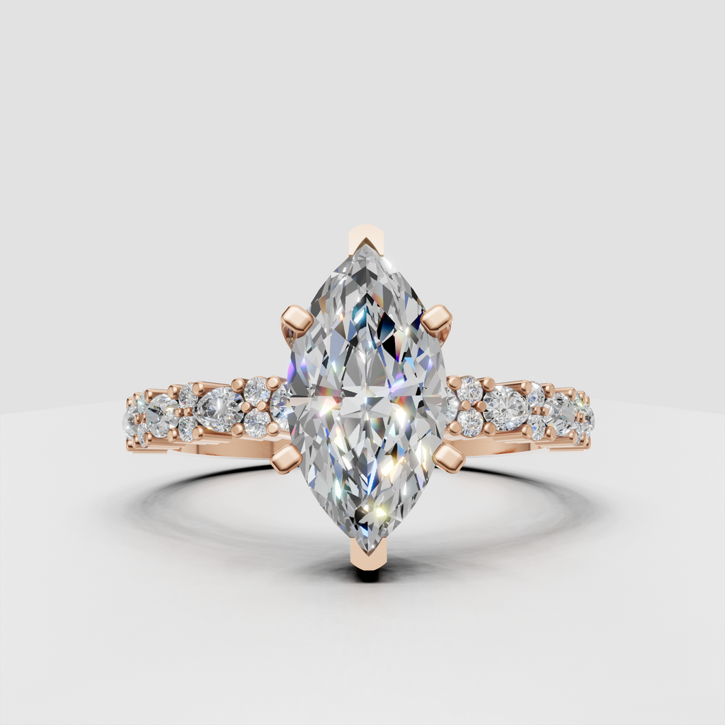 Yellow gold pear engagement ring with prong-set center stone