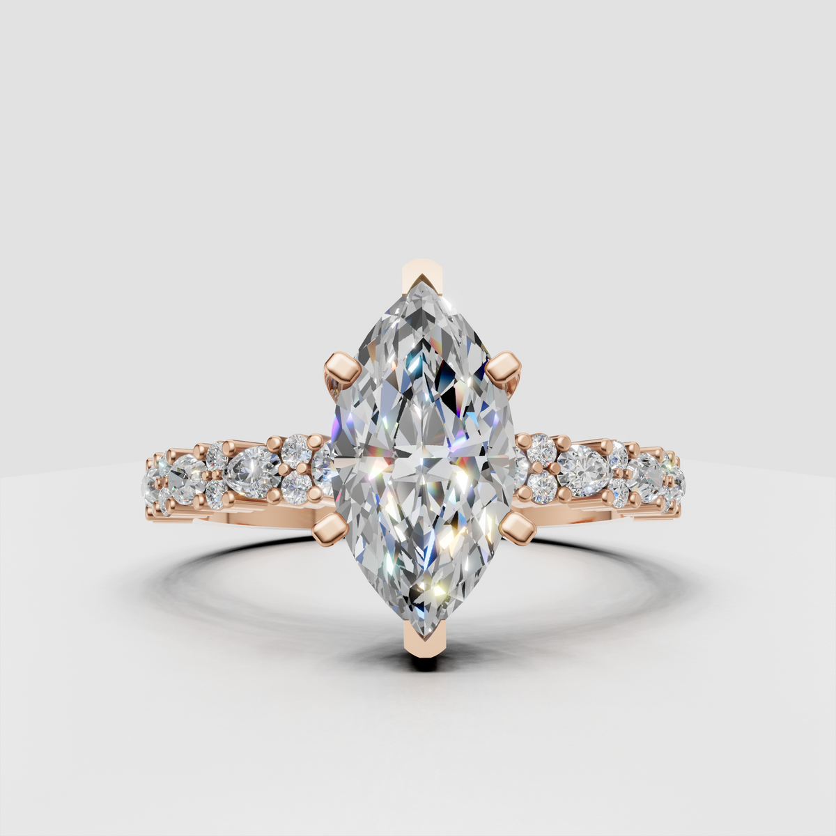 Yellow gold pear engagement ring with prong-set center stone
