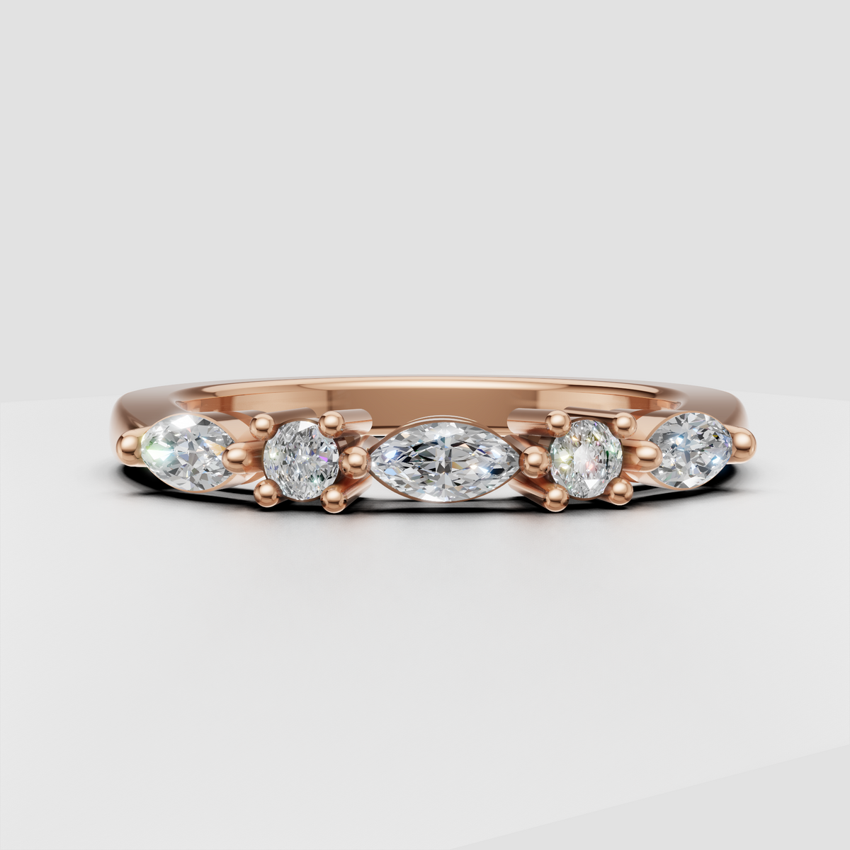 Marquise diamond ring with four complementary side diamonds
